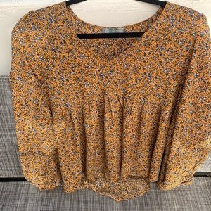Orange floral blouse